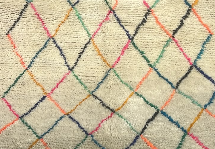 Detail of Small Cream Moroccan Rug with Colorful Diamond Grid, 160 × 110 cm.