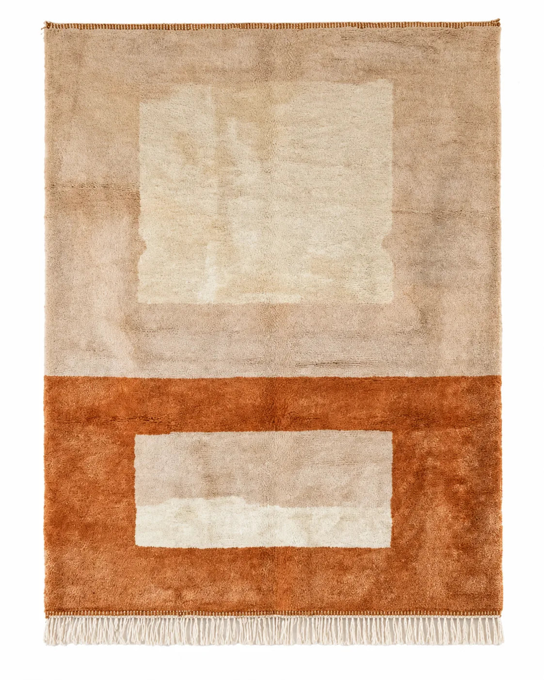 Mrirt wool rug, interlocking geometric rectangles in sand and terracotta in a living room setting