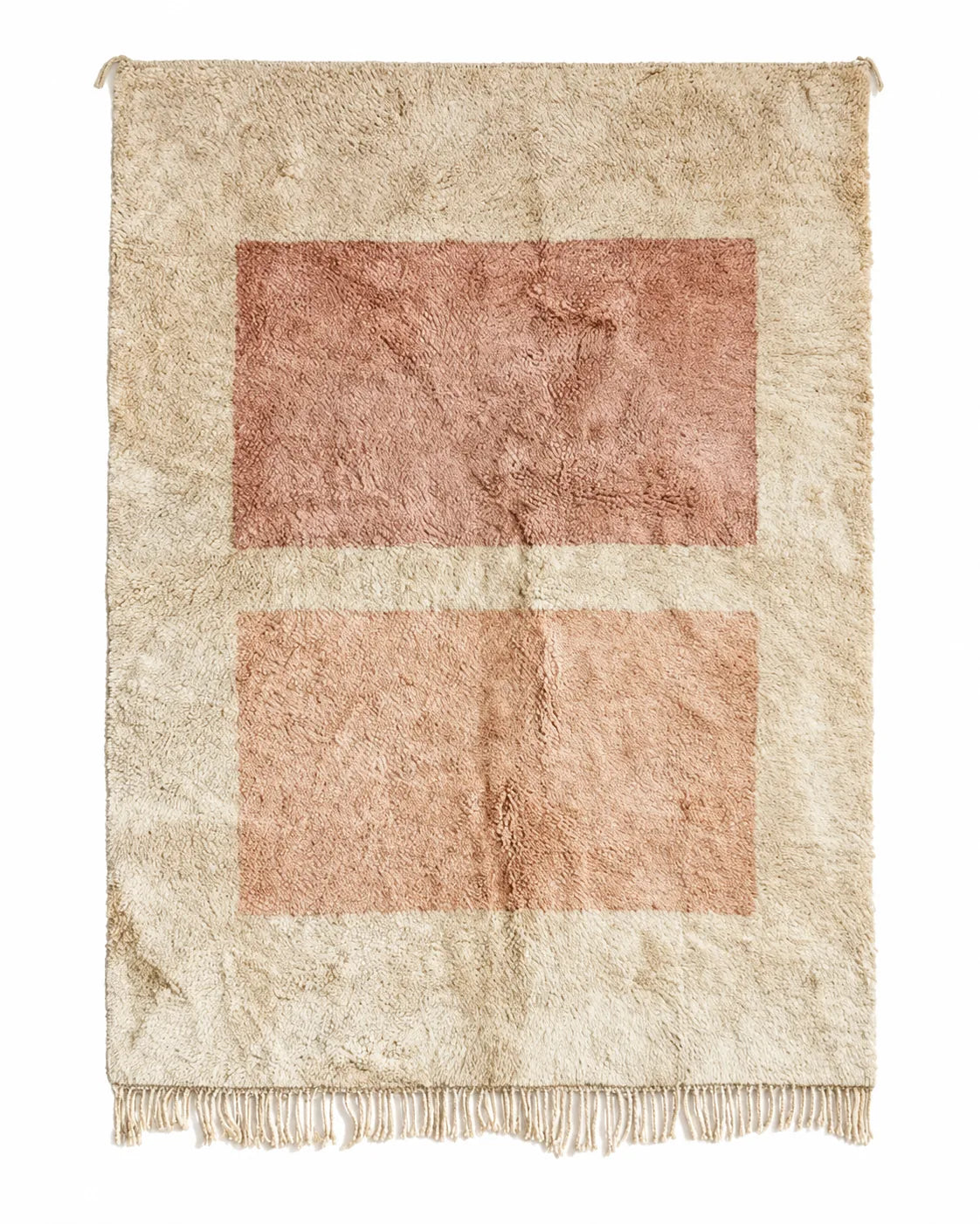 Front view of Mrirt wool rug, pink and peach-beige geometric rectangles on a light ground