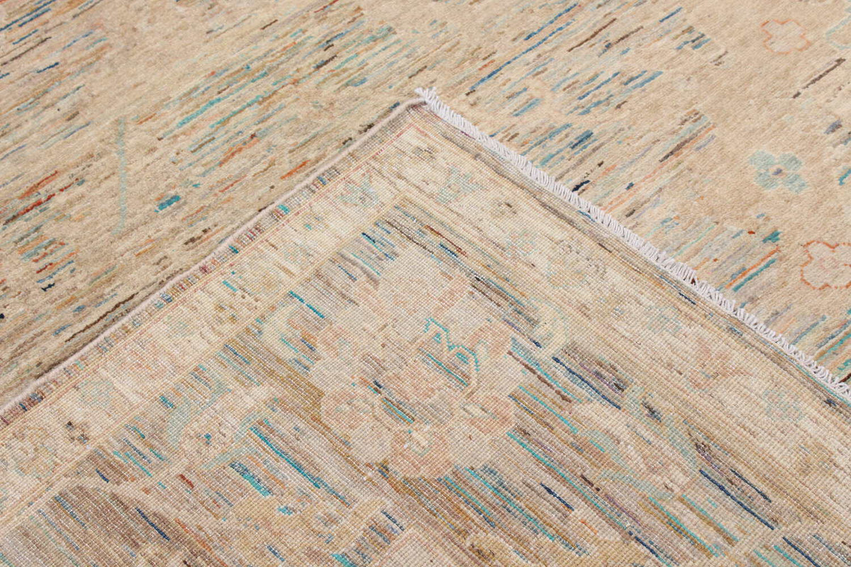 Close-up of the sand beige Afghan rug with pastel blue flowers, 302 × 250 cm, detail 9.