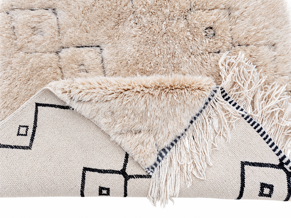 Detail of Beige Beni Ourain Wool Rug with Diamonds, 415 × 275 cm.