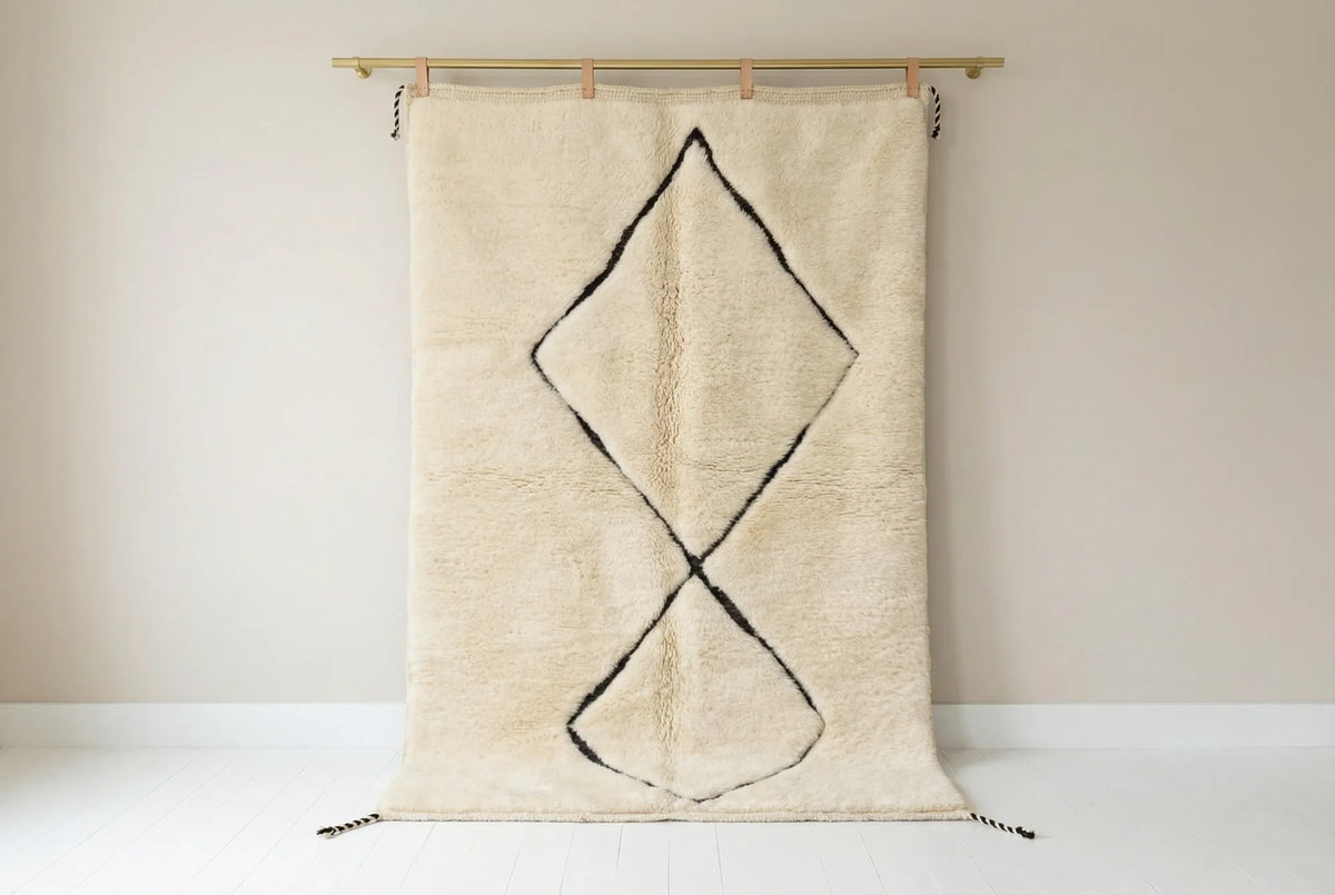 Beni Ourain wool rug, cream ground with two black diamonds, product view 2