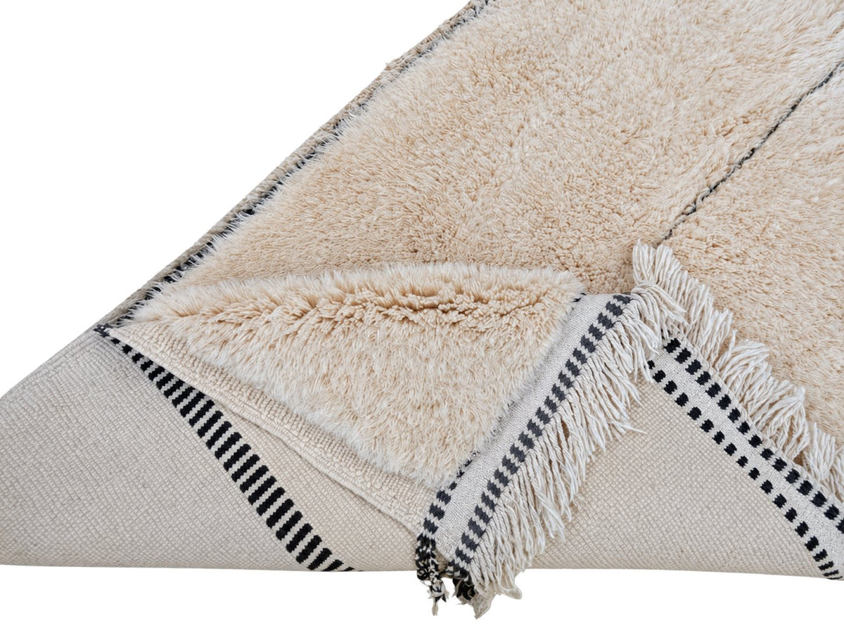 Detail of Natural White Beni Ourain Rug with Black Stripes, 435 × 304 cm.
