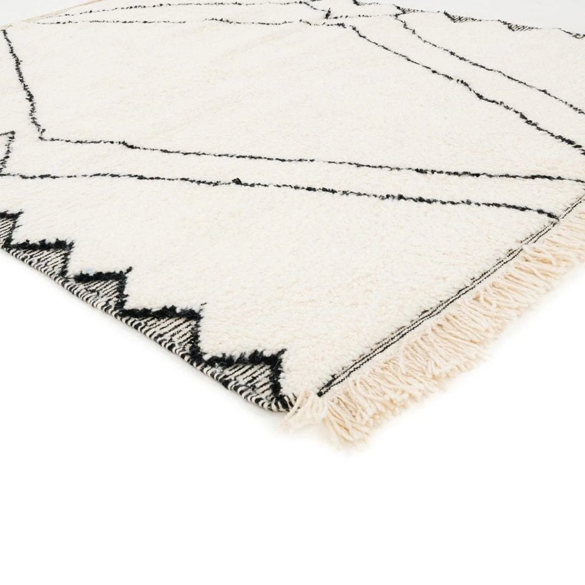 Beni Ourain wool rug, cream ground with a large diamond and a black zigzag border, product view 3