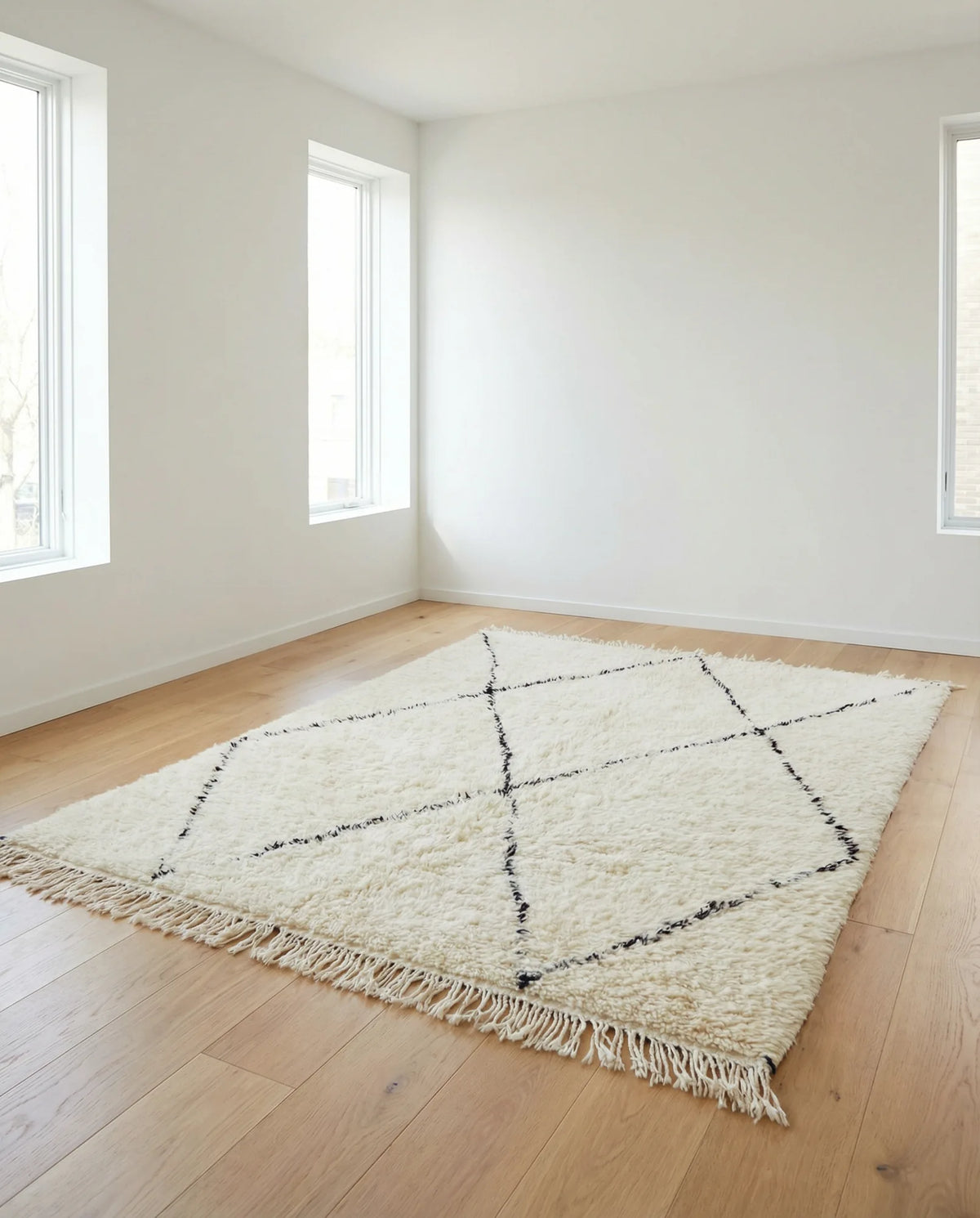 Beni Ourain wool rug, cream ground with an open black diamond lattice, product view 2