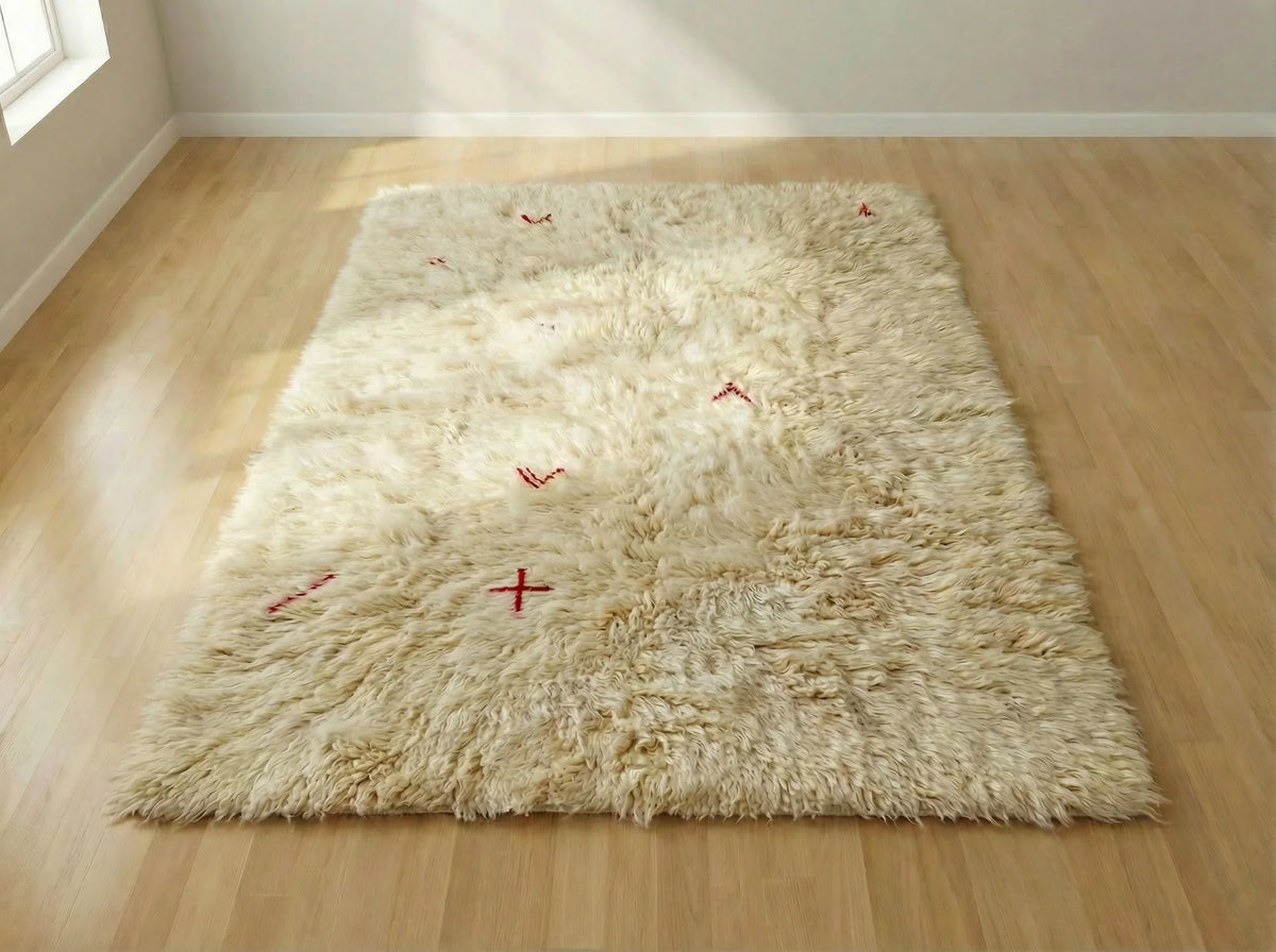 Beni Ourain wool rug, cream ground with small red crosses and angular marks, product view 4
