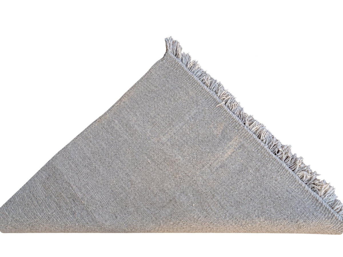 Detail of Taupe Beni Ourain Wool Rug with Block Relief, 370 × 283 cm.