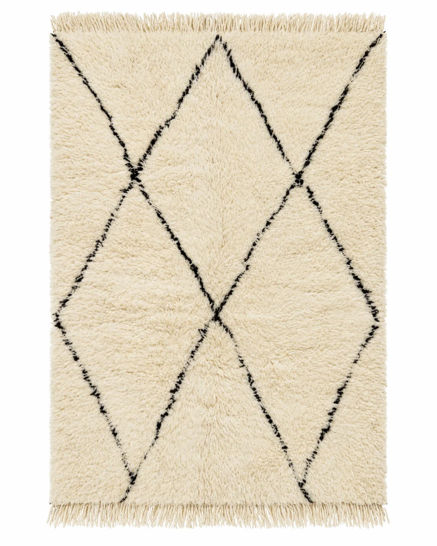 Front view of Beni Ourain wool rug, black diamond outlines on natural white high-pile wool