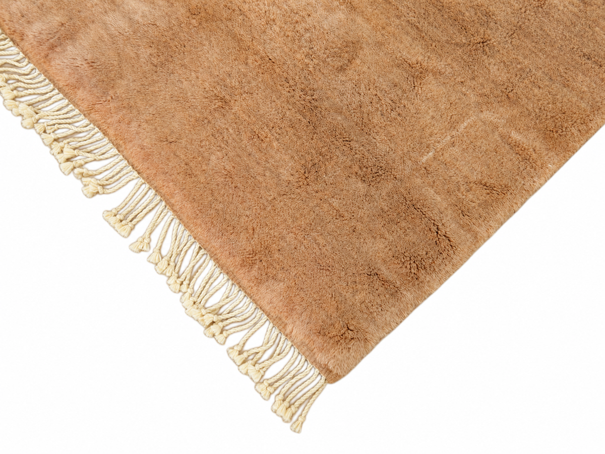 Fringe and edge detail of Amber Moroccan Wool Rug with Fringe, 365 × 215 cm.