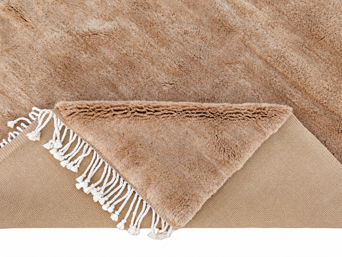 Fringe and edge detail of Amber Moroccan Wool Rug with Fringe, 365 × 215 cm.