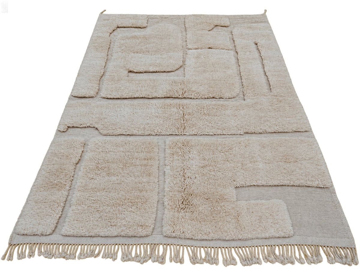Detail of Cream Moroccan Wool Rug with Abstract Relief, 317 × 220 cm.