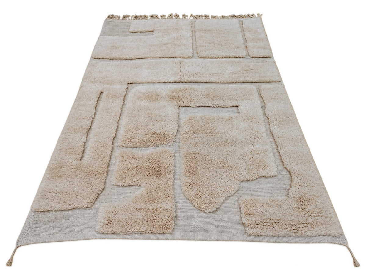 Detail of Cream Moroccan Wool Rug with Abstract Relief, 317 × 220 cm.