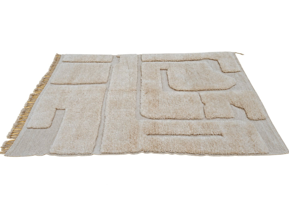 Detail of Cream Moroccan Wool Rug with Abstract Relief, 317 × 220 cm.