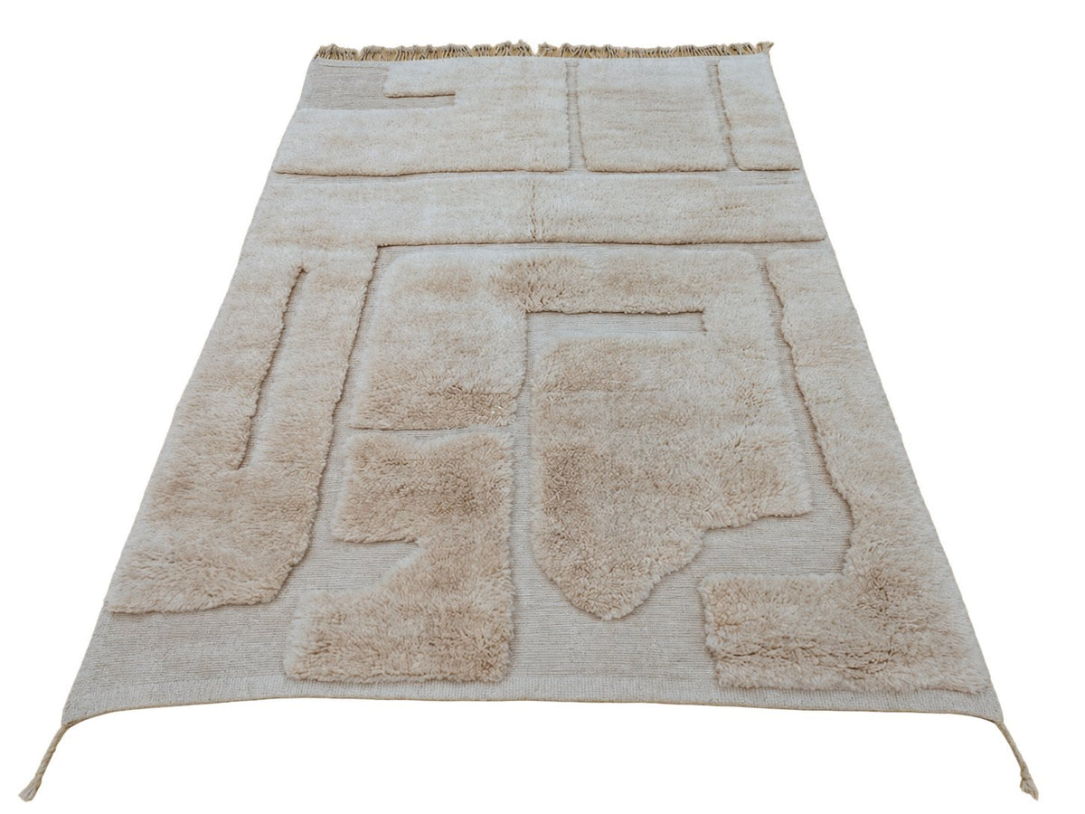 Detail of Cream Moroccan Wool Rug with Abstract Relief, 317 × 220 cm.
