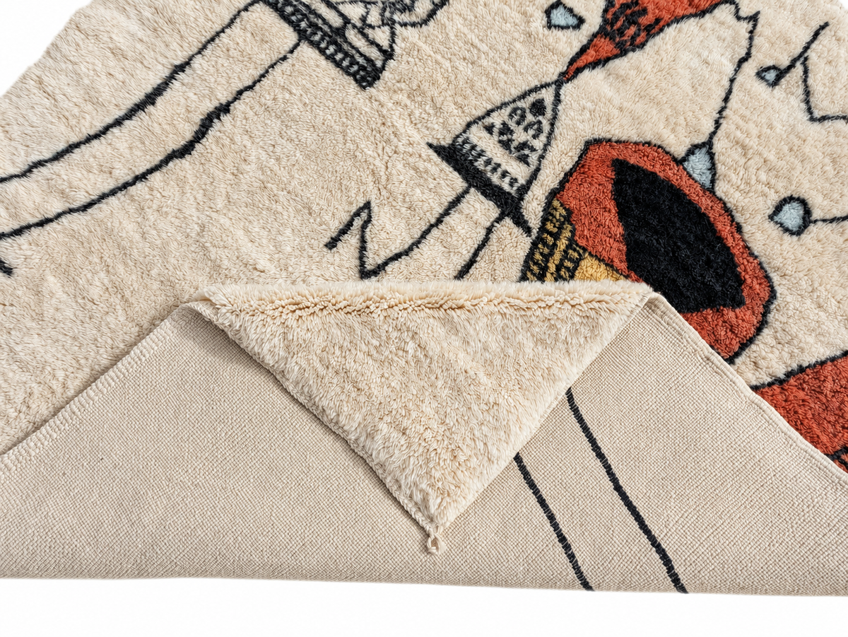 Detail of Cream Moroccan Wool Rug with Musician Motif, 305 × 198 cm.