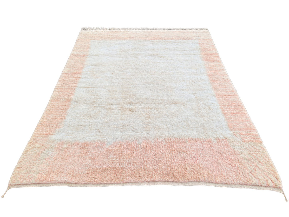 Detail of Cream and Peach Moroccan Rug with Border, 428 × 397 cm.