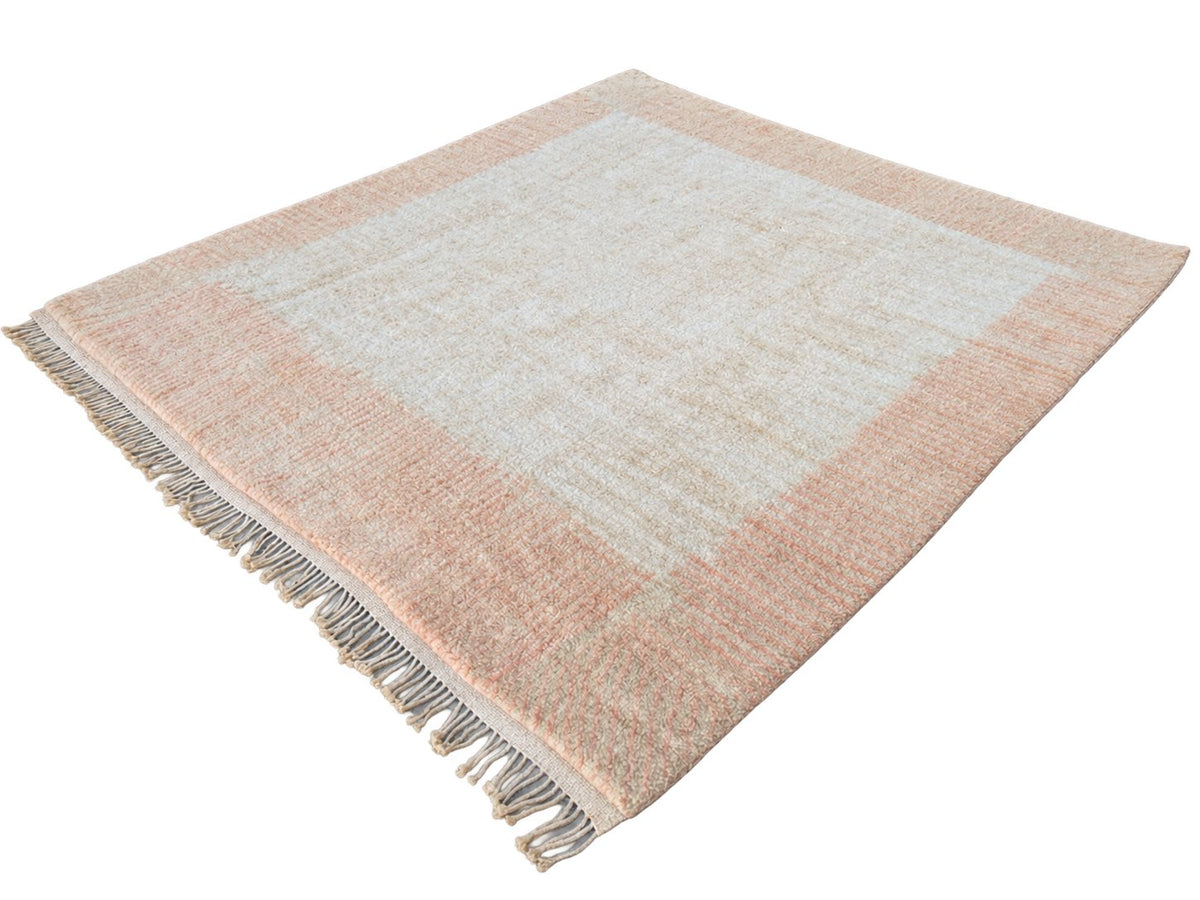 Detail of Cream and Peach Moroccan Rug with Border, 428 × 397 cm.