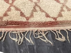 Fringe and edge detail of Cream Vintage Moroccan Rug with Brown Diamond Grid, 315 × 200 cm.
