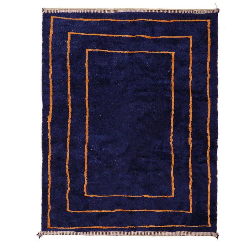 Mrirt wool rug, orange geometric frames on a deep blue wool ground