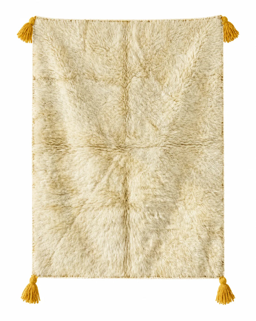 Front view of Moroccan wool rug, natural cream ground with a simple geometric design