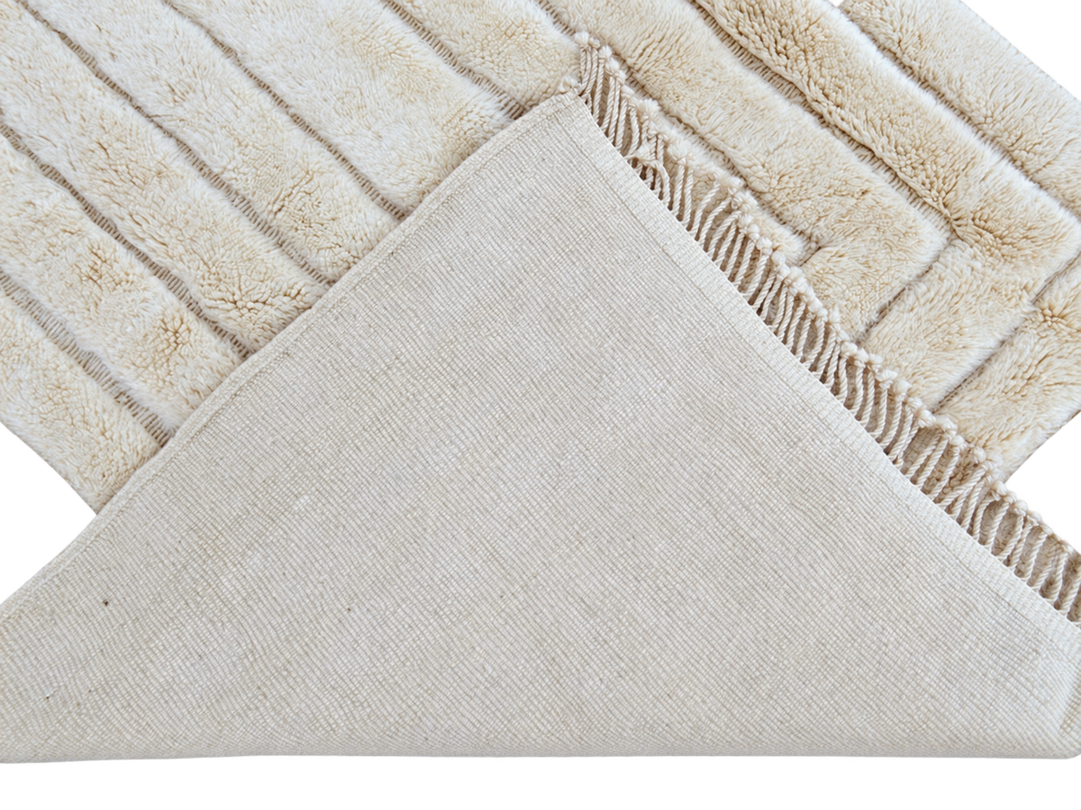 Detail of Natural White Mrirt Wool Rug with Rectangle Relief, 313 × 220 cm.