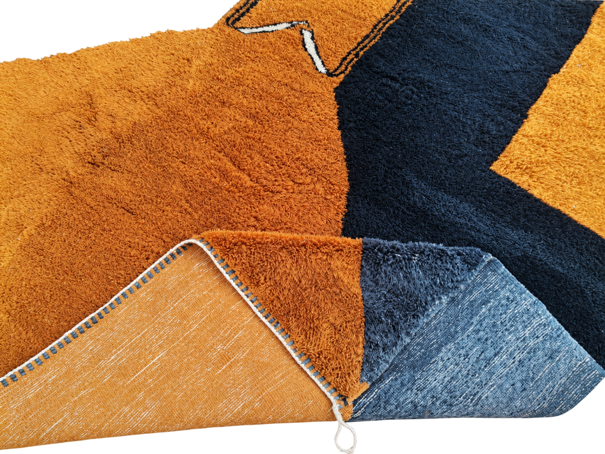 Detail of Terracotta and Black Moroccan Rug with Abstract Pattern, 392 × 303 cm.