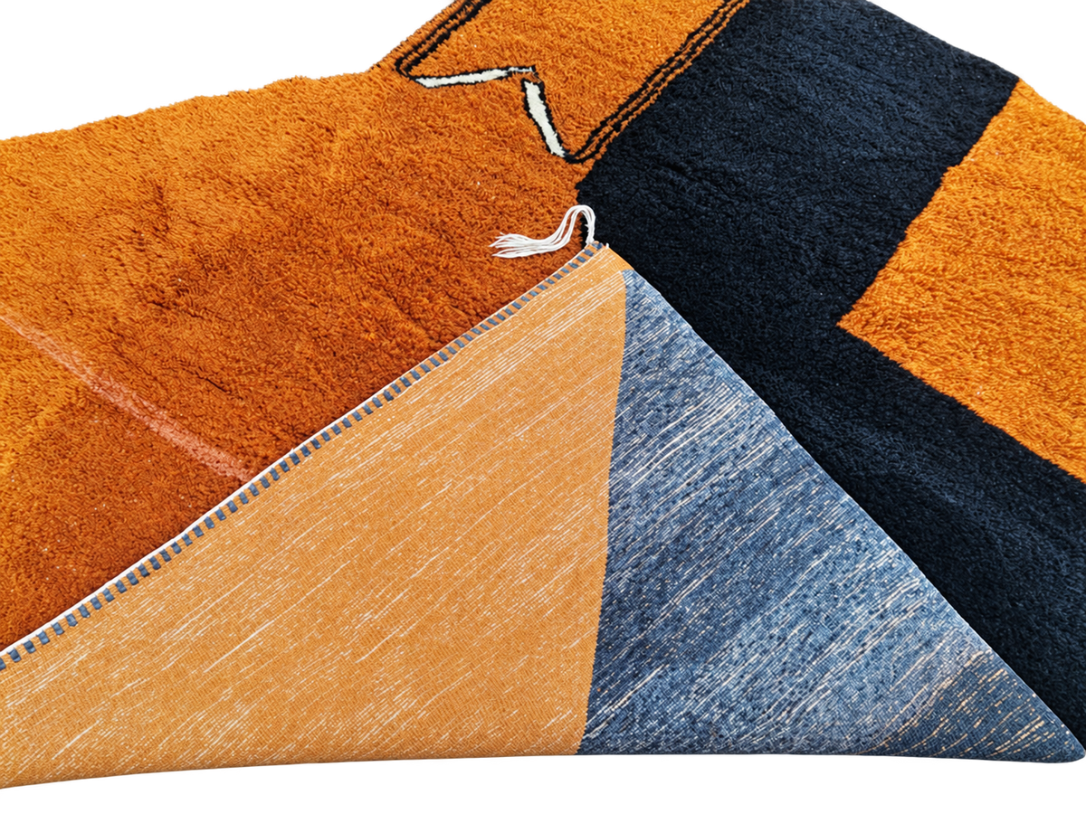 Detail of Terracotta and Black Moroccan Rug with Abstract Pattern, 392 × 303 cm.