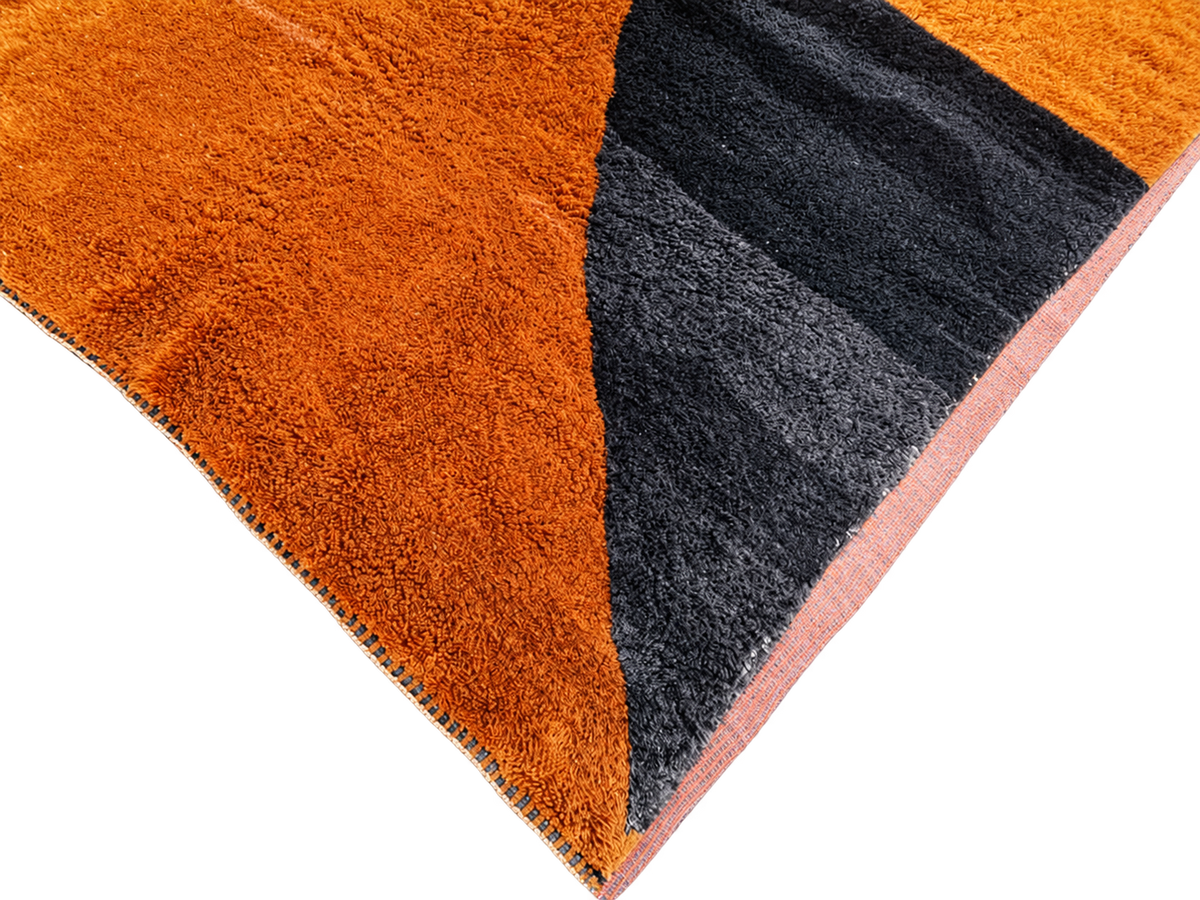 Detail of Terracotta and Black Moroccan Rug with Abstract Pattern, 392 × 303 cm.