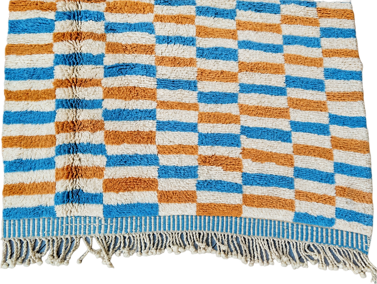Detail of White, Mustard, and Blue Moroccan Rug with Checks, 305 × 235 cm.