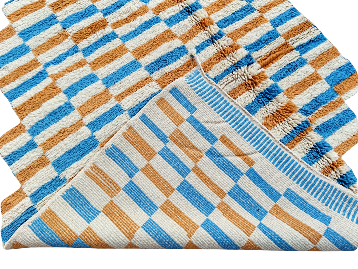 Detail of White, Mustard, and Blue Moroccan Rug with Checks, 305 × 235 cm.