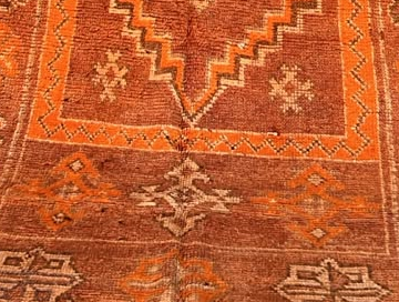 Detail of Orange Vintage Moroccan Rug with Stepped Diamond Medallion, 300 × 140 cm.