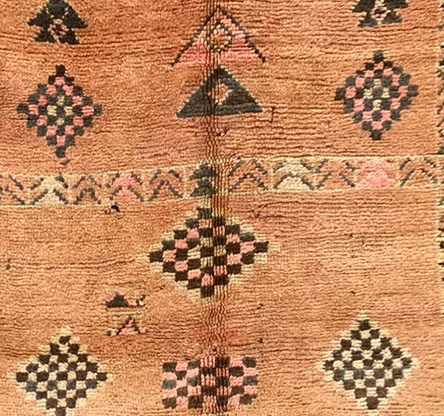 Pattern detail from the original photograph of Apricot Vintage Moroccan Rug with Black Diamonds and Symbols, 273 × 163 cm.