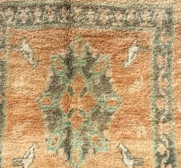 Pattern detail from the original photograph of Beige and Turquoise Vintage Moroccan Rug with Floral Medallion, 244 × 176 cm.