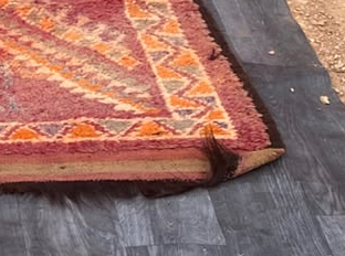Fringe and edge detail of Burgundy Vintage Moroccan Rug with Ochre Diamond Medallion, 293 × 164 cm.