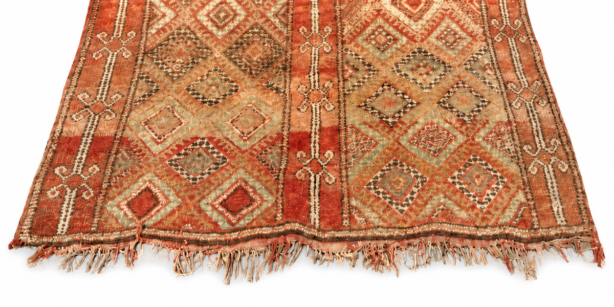 Edge detail of Vintage Moroccan Rug with Red Stripes and Light Diamonds, 310 × 180 cm.