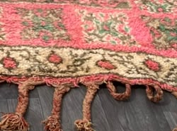Fringe and edge detail of Pink and Green Vintage Moroccan Rug with Ornamental Panels, 368 × 210 cm.