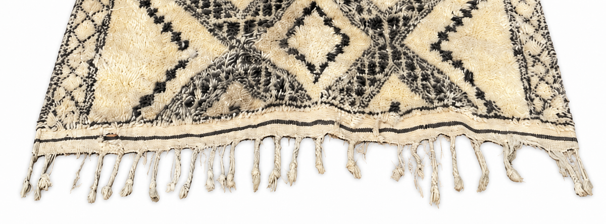Edge detail of Black and Cream Vintage Moroccan Rug with Diamonds, 330 × 160 cm.