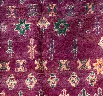 Pattern detail from the original photograph of Purple Vintage Moroccan Rug with Light Symbol Rows, 277 × 186 cm.